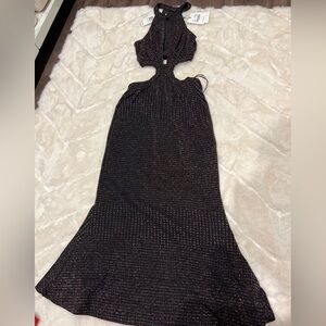 Misha dress in black midi length! Body hugging and beautiful cut outs!